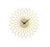 Wanduhr mit blütenförmigem Metallrahmen und weißem Zifferblatt, goldene Details