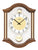 Wanduhr mit Nussbaum-Holzgehäuse, rundem Zifferblatt und goldenem Pendelgewicht