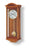 Wanduhr mit massivem Holzgehäuse in Kirschbaumoptik und weißem Zifferblatt