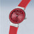 Damenuhr mit rotem Zifferblatt, silbernen Zeigern und Edelstahlgehäuse, rotes Armband.