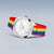 Bering Uhr mit silbernem Gehäuse, weißem Zifferblatt und rotem Regenbogen-Textilband