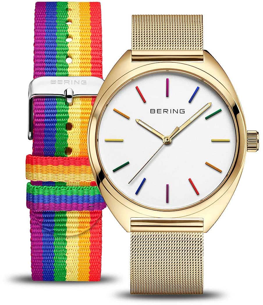 Herrenuhr mit weißem Zifferblatt, goldfarbenem Gehäuse und bunter Stoffarmband-Schließe