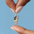 Snoopy-Charm aus 925 Sterlingsilber, schwarz und gelb, an der Öse
