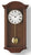 Wanduhr mit dunkelbraunem Holzgehäuse, rundem Zifferblatt und Metallpendel