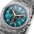 Citizen Super Titanium Uhr mit türkisgrünem Zifferblatt, Leuchtindizes und Chronographen-Layout.