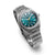 Herrenuhr 3/4-Seite: teal Zifferblatt, silbernes Titanarmband, markantes Gehäuseprofil