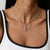 Silberne Halskette mit kleinem Snoopy-Charm und buntem Stein