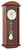 Wanduhr mit nussbaumfarbenem Holzgehäuse, rundem Zifferblatt und Pendel mit Westminster-Relief