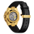 Armbanduhr-Rückansicht: sichtbares Uhrwerk unter Glas, goldfarbenes Gehäuse, schwarzes Lederband.