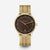 Sternglas Herrenuhr mit goldfarbenem Metallarmband und braunem Zifferblatt, rund