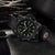 Luminox RECON-Herrenuhr in Schwarz mit grün leuchtenden Zeigern und gepolstertem Armband