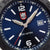 Nahaufnahme: blaue Taucheruhr mit Luminox Logo, Stundenmarken und Datumsfenster