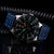 Taucheruhr mit blauem Armband, schwarzem Zifferblatt mit Leuchtanzeigen und Chronograph