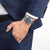 Citizen Herrenuhr am Handgelenk mit dunkelblauem Zifferblatt und silbernem Armband
