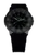 Herrenuhr-Detail: schwarzes Armband und Zifferblatt mit grüner Leuchtanzeige