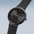 Bering-Armbanduhr mit rundem schwarzem Zifferblatt, rotem Sekundenzeiger und schwarzem Armband