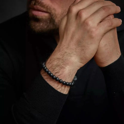 Armband aus 8mm großen schwarzen Edelsteinen mit schwarzem Stahlverschluss - Rebel&Rose Modell: RR-80082-B-M