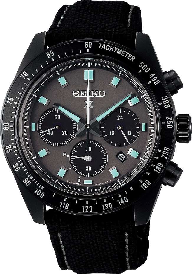 Seiko Herrenuhr mit schwarzem Stoffband, dunkelgrünem Zifferblatt, Chronograph und Tachymeter.