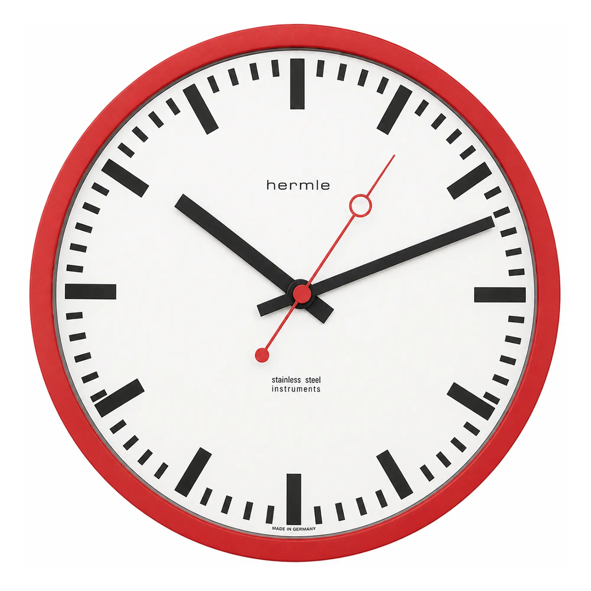 Wanduhr mit rotem Rand, weißem Zifferblatt und schwarzen Zeigern