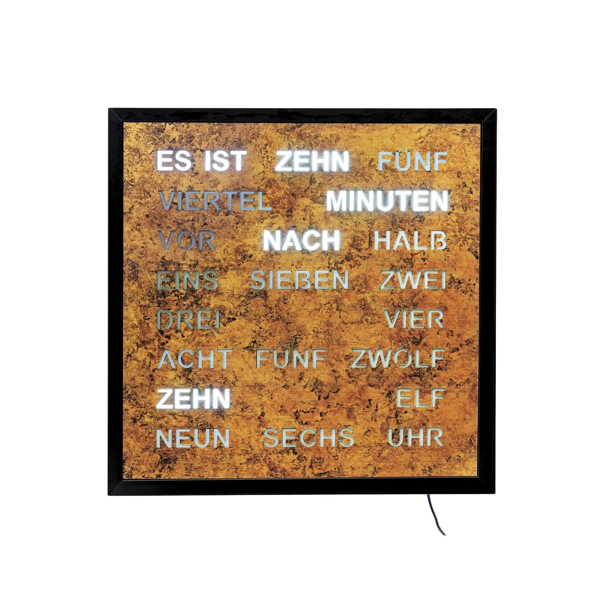 Wortuhr mit LED-Anzeige auf goldbraunem Hintergrund, schwarzer Rahmen, Netzkabel