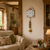 Wanduhr mit Blumen-Zifferblatt und goldenem Pendel, rundes Pendelgewicht