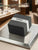 Zeppelin Uhrenbox im Geschenkdesign, schwarz-grau, auf Metalltablett