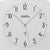 Wanduhr-Anzeige mit großen Ziffern, AMS-Logo und Funkwellensymbol